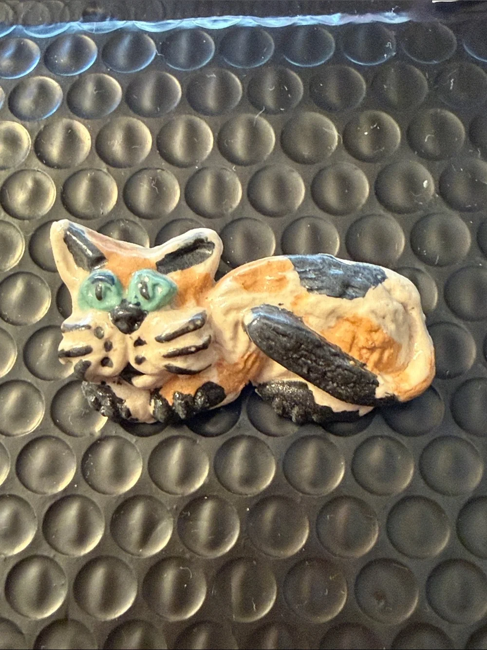 SOLD Hand Painted Clay Calico Laying Cat Brooch